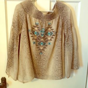 Beautiful Flowy off the shoulder blouse.